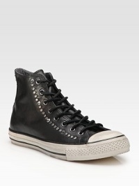 A classic Converse look in smooth leather with nailhead stud detail. Rubber toe cap Padded insole Rubber sole Imported 