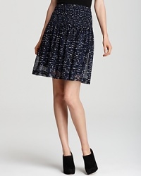 Make a graphic impact in this DKNY skirt, boasting a pleated silhouette alive with a digital print. Showcase the style with sharp booties for a modern feminine statement. Make a graphic impact in this DKNY skirt, boasting a pleated silhouette alive with a digital print. Showcase the style with sharp booties for a modern feminine statement.