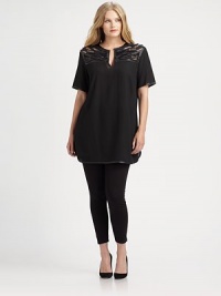 Buttery leather makes an impressive appearance on this tunic featuring exquisite hand-crochet embroidery. Split neckElbow-length sleevesHand-crochet yokeLeather detailsCurved hemAbout 32 from shoulder to hemViscose/woolDry clean by leather specialistImported Buttery leather makes an impressive appearance on this tunic featuring exquisite hand-crochet embroidery. Split neckElbow-length sleevesHand-crochet yokeLeather detailsCurved hemAbout 32 from shoulder to hemViscose/woolDry clean by leather specialistImported