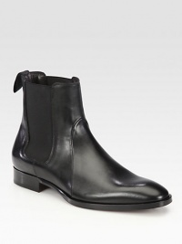 Side elastic gores and minimal detailing shapes and defines this charming chelsea boot constructed in Italy from smooth, supple calfskin leather.Leather upperLeather liningPadded insoleLeather soleMade in Italy Side elastic gores and minimal detailing shapes and defines this charming chelsea boot constructed in Italy from smooth, supple calfskin leather.Leather upperLeather liningPadded insoleLeather soleMade in Italy