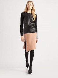 A luxe, lambskin leather front panel lends modern sophistication to this trim-fit pullover style.Rib-knit long sleevesLeather front panel35% cashmere/35% merino wool/30% silkDry cleanImported of Italian fabricModel shown is 5'9½ (176cm) wearing US size Small. A luxe, lambskin leather front panel lends modern sophistication to this trim-fit pullover style.Rib-knit long sleevesLeather front panel35% cashmere/35% merino wool/30% silkDry cleanImported of Italian fabricModel shown is 5'9½ (176cm) wearing US size Small.