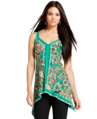 An asymmetrical hem and a bold, exotic print spice up INC's unique tunic tank! Try it with leggings or capris for a fresh look. An asymmetrical hem and a bold, exotic print spice up INC's unique tunic tank! Try it with leggings or capris for a fresh look.