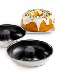 When it comes to donuts, the bigger the better! Take celebrations to a whole new level with this over-sized donut cake pan-simply add cake batter, bake and then ice and sprinkle to resemble your favorite sweet treat. Crafted from a nonstick-coated aluminum, this pan heats up fast, cleans up easy and guarantees a perfectly golden donut cake. When it comes to donuts, the bigger the better! Take celebrations to a whole new level with this over-sized donut cake pan-simply add cake batter, bake and then ice and sprinkle to resemble your favorite sweet treat. Crafted from a nonstick-coated aluminum, this pan heats up fast, cleans up easy and guarantees a perfectly golden donut cake.
