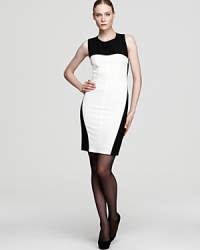 Make a memorable entrance and exit in this sleeveless standout that reveals an unexpected criss cross design in back. Make a memorable entrance and exit in this sleeveless standout that reveals an unexpected criss cross design in back.
