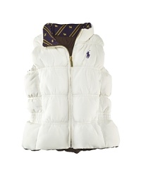 Soft to the touch and supremely plush, this cozy puffer vest features a reversible silhouette, making it the perfect two-in-one layer for the colder months. Soft to the touch and supremely plush, this cozy puffer vest features a reversible silhouette, making it the perfect two-in-one layer for the colder months.