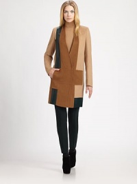 Soft double-faced camel hair, in a colorblock patchwork design enhanced by supple leather insets.V necklineConcealed snap closuresSide slash pocketsLeather insetsFully linedAbout 32 from shoulder to hemCamel hairDry cleanMade in Switzerland of Italian fabricModel shown is 5'11 (180cm) wearing US size 4. Soft double-faced camel hair, in a colorblock patchwork design enhanced by supple leather insets.V necklineConcealed snap closuresSide slash pocketsLeather insetsFully linedAbout 32 from shoulder to hemCamel hairDry cleanMade in Switzerland of Italian fabricModel shown is 5'11 (180cm) wearing US size 4.