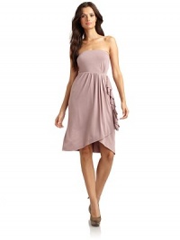 THE LOOKBandeau topElastic tiersCascading ruffles down one side of the waistTulip hemTHE FITAbout 36 from shoulder to hemTHE MATERIALModal/spandexCARE & ORIGINDry cleanMade in USAModel shown is 5'9½ (176cm) wearing US size Small. THE LOOKBandeau topElastic tiersCascading ruffles down one side of the waistTulip hemTHE FITAbout 36 from shoulder to hemTHE MATERIALModal/spandexCARE & ORIGINDry cleanMade in USAModel shown is 5'9½ (176cm) wearing US size Small.