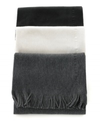 Top off your cold-weather wardrobe with the sleek, versatile style and ultra-soft feel of this solid Hugo Boss fringe scarf, crafted in a smooth blend of virgin wool and Pima cotton. Top off your cold-weather wardrobe with the sleek, versatile style and ultra-soft feel of this solid Hugo Boss fringe scarf, crafted in a smooth blend of virgin wool and Pima cotton.