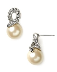 Dazzle on your walk down the aisle with this pair of silver and crystal post earrings. These delicate pearl drops are an simple statement for the bride-to-be with classic style. Dazzle on your walk down the aisle with this pair of silver and crystal post earrings. These delicate pearl drops are an simple statement for the bride-to-be with classic style.