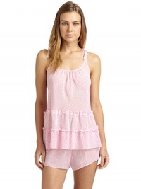 THE LOOKCandy stripe printSemi-sheer designPleated scoopneckAdjustable straps with bow detailsRuffled detailsElastic waistTHE FITTop: about 27 from shoulder to hemPants: rise, about 9; inseam, about 1.55THE MATERIALPolyesterCARE & ORIGINMachine washImportedModel shown is 5'9 (175cm) wearing US size Small. THE LOOKCandy stripe printSemi-sheer designPleated scoopneckAdjustable straps with bow detailsRuffled detailsElastic waistTHE FITTop: about 27 from shoulder to hemPants: rise, about 9; inseam, about 1.55THE MATERIALPolyesterCARE & ORIGINMachine washImportedModel shown is 5'9 (175cm) wearing US size Small.