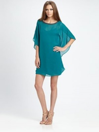 Gauzy silk chiffon, embellished with a glamorous beaded neckline.Beaded jewel necklineElbow-length caftan sleevesSilk slip liningAbout 21 from natural waistSilkDry cleanImportedModel shown is 5'10 (177cm) wearing US size 4.OUR FIT MODEL RECOMMENDS ordering true size. Gauzy silk chiffon, embellished with a glamorous beaded neckline.Beaded jewel necklineElbow-length caftan sleevesSilk slip liningAbout 21 from natural waistSilkDry cleanImportedModel shown is 5'10 (177cm) wearing US size 4.OUR FIT MODEL RECOMMENDS ordering true size.