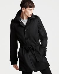 A sleek, single-breasted silhouette in classic black. From Burberry. A sleek, single-breasted silhouette in classic black. From Burberry.