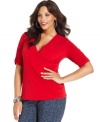 A wrap front lends a chic finish to Style&co.'s elbow sleeve plus size top.
