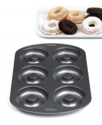 Get 'em while they're hot! Feast on your favorite morning pick-me-up right in the comfort of your home with this durable, nonstick solution to making masterpiece doughnuts in minutes. The healthier and tastier alternative to fried doughnuts, baked doughnuts are quick and easy to create and clean-up is fast with this dishwasher-safe pan. 10-year warranty. Get 'em while they're hot! Feast on your favorite morning pick-me-up right in the comfort of your home with this durable, nonstick solution to making masterpiece doughnuts in minutes. The healthier and tastier alternative to fried doughnuts, baked doughnuts are quick and easy to create and clean-up is fast with this dishwasher-safe pan. 10-year warranty.
