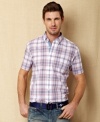 Get noticed. Bold plaid pops so you'll stand out in the scene with this plaid shirt from Nautica.
