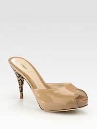 Gorgeous patent leather peep-toe modernized by a logo-detail heel.Stacked heel, 4 (100mm) Hidden platform, 1 (25mm) Compares to a 3 heel (75mm) Slip-on style Leather lining and sole Padded insole Made in ItalyOUR FIT MODEL RECOMMENDS ordering true size.. Additional Information Women's Shoe Size Guide (International Equivalents) Gorgeous patent leather peep-toe modernized by a logo-detail heel.Stacked heel, 4 (100mm) Hidden platform, 1 (25mm) Compares to a 3 heel (75mm) Slip-on style Leather lining and sole Padded insole Made in ItalyOUR FIT MODEL RECOMMENDS ordering true size.. Additional Information Women's Shoe Size Guide (International Equivalents)