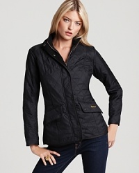 Fashion meets function in this Barbour jacket--a slimming silhouette flatters the figure while signature polarquilt fabric keeps you dry in unfriendly climates. Fashion meets function in this Barbour jacket--a slimming silhouette flatters the figure while signature polarquilt fabric keeps you dry in unfriendly climates.