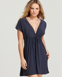 A hooded silhouette lends a sporty look to a Magicsuit swim coverup. A hooded silhouette lends a sporty look to a Magicsuit swim coverup.