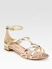 Sleek metallic leather silhouette with jewel detail and an adjustable ankle strap. Metallic leather upperLeather lining and solePadded insoleMade in ItalyOUR FIT MODEL RECOMMENDS ordering true size. Sleek metallic leather silhouette with jewel detail and an adjustable ankle strap. Metallic leather upperLeather lining and solePadded insoleMade in ItalyOUR FIT MODEL RECOMMENDS ordering true size.