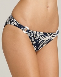 Bring a denim look to the poolside with this Ralph Lauren Blue Label bikini bottom, accented with bright white jute-wrapped O-rings and a tropical print. Bring a denim look to the poolside with this Ralph Lauren Blue Label bikini bottom, accented with bright white jute-wrapped O-rings and a tropical print.