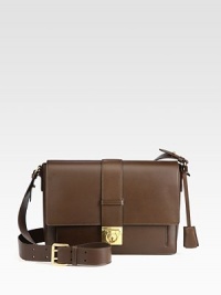A smooth leather style with a chic boxy frame accented in radiant hardware.Adjustable shoulder strap, 23-25½ dropFlip-lock flap closureOne outside open pocketOne open pocket under flapOne inside zip pocketLeather lining11¼W X 8½H X 3DImported A smooth leather style with a chic boxy frame accented in radiant hardware.Adjustable shoulder strap, 23-25½ dropFlip-lock flap closureOne outside open pocketOne open pocket under flapOne inside zip pocketLeather lining11¼W X 8½H X 3DImported