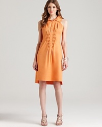 In a zingy citrus hue, this Elie Tahari dress energizes your 9-to-5 style. Perk up the look with sleek silver accents and take it after hours. In a zingy citrus hue, this Elie Tahari dress energizes your 9-to-5 style. Perk up the look with sleek silver accents and take it after hours.