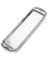 With its exceptionally versatile material and ornate handle detail, the long Belle Mont tray from Wilton Armetale is indispensable for entertaining at home. With its exceptionally versatile material and ornate handle detail, the long Belle Mont tray from Wilton Armetale is indispensable for entertaining at home.