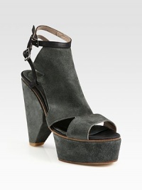 Suede and leather platform design enhanced by an architectural heel and finished with adjustable ankle straps. Suede heel, 5 (125mm)Self-covered platform, 2 (50mm)Compares to a 3 heel (75mm)Suede and leather upperSuede and leather liningLeather solePadded insoleImportedOUR FIT MODEL RECOMMENDS ordering true whole size; ½ sizes should order the next whole size up. Suede and leather platform design enhanced by an architectural heel and finished with adjustable ankle straps. Suede heel, 5 (125mm)Self-covered platform, 2 (50mm)Compares to a 3 heel (75mm)Suede and leather upperSuede and leather liningLeather solePadded insoleImportedOUR FIT MODEL RECOMMENDS ordering true whole size; ½ sizes should order the next whole size up.