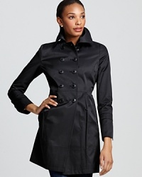 Bring a classic finish to your look with this double-breasted trench style from DKNY. Pleating adds a sophisticated, feminine touch. Bring a classic finish to your look with this double-breasted trench style from DKNY. Pleating adds a sophisticated, feminine touch.