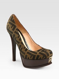 Monogram pump of textured jacquard, lifted by a logoed platform and stacked heel. Stacked heel, 5 (125mm)Stacked platform, 1 (25mm)Compares to a 4 heel (100mm)Jacquard canvas upperLeather lining and solePadded insoleMade in ItalyOUR FIT MODEL RECOMMENDS ordering one size up as this style runs small. Monogram pump of textured jacquard, lifted by a logoed platform and stacked heel. Stacked heel, 5 (125mm)Stacked platform, 1 (25mm)Compares to a 4 heel (100mm)Jacquard canvas upperLeather lining and solePadded insoleMade in ItalyOUR FIT MODEL RECOMMENDS ordering one size up as this style runs small.