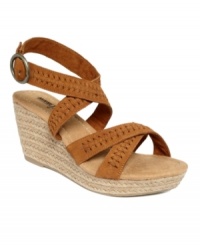 Swing into spring: The Haley wedge sandals by Minnetonka Moccasin feature authentic yet trendy details to add a natural air to your look. A classic espadrille wedge tops off a braided suede silhouette. Swing into spring: The Haley wedge sandals by Minnetonka Moccasin feature authentic yet trendy details to add a natural air to your look. A classic espadrille wedge tops off a braided suede silhouette.