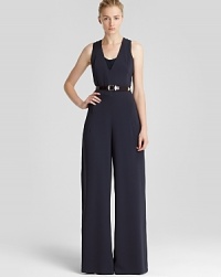 A real statement, this wide leg REISS jumpsuit stands tall on fall's style-scape and is a powerful alternative to a glitzy dress. With a hint of '70s inspiration, team this tailored style with towering heels for a retro redux. A real statement, this wide leg REISS jumpsuit stands tall on fall's style-scape and is a powerful alternative to a glitzy dress. With a hint of '70s inspiration, team this tailored style with towering heels for a retro redux.