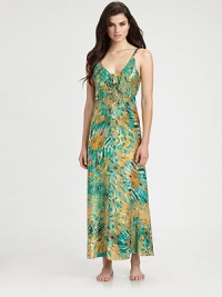 Slip into this lightweight design in a vivid floral print, with a feminine ruffled neckline. V-neck with ruffle trimAdjustable strapsPull-on styleAbout 51 from shoulder to hemPolyesterMachine washImported Slip into this lightweight design in a vivid floral print, with a feminine ruffled neckline. V-neck with ruffle trimAdjustable strapsPull-on styleAbout 51 from shoulder to hemPolyesterMachine washImported