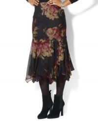 A sweeping floral pattern and flowing pleats along the hemline lend a fluid feminine appeal to Lauren Ralph Lauren's silk skirt. A sweeping floral pattern and flowing pleats along the hemline lend a fluid feminine appeal to Lauren Ralph Lauren's silk skirt.
