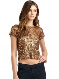 THE LOOKJewel necklineShort sleevesAllover sequinsBack zipTHE FITAbout 18 from shoulder to hemTHE MATERIALPolyesterCARE & ORIGINHand washImported THE LOOKJewel necklineShort sleevesAllover sequinsBack zipTHE FITAbout 18 from shoulder to hemTHE MATERIALPolyesterCARE & ORIGINHand washImported