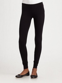 Body-hugging stretch knit, perfect for layering with a draped cardigan or tunic top.Mid-rise waist Slightly ruched hem Pull-on style 47% pima cotton/47% modal/6% spandex Machine wash Made in USA Body-hugging stretch knit, perfect for layering with a draped cardigan or tunic top.Mid-rise waist Slightly ruched hem Pull-on style 47% pima cotton/47% modal/6% spandex Machine wash Made in USA