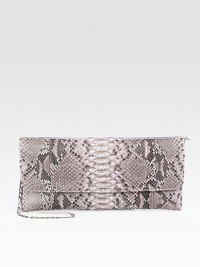 Luxurious python in a sleek and chic flap design with a concealable chain strap.Concealable chain shoulder strap, 14 dropMagnetic flap closureOne inside zip pocketSuede lining12W X 5¾H X ¾DImported Luxurious python in a sleek and chic flap design with a concealable chain strap.Concealable chain shoulder strap, 14 dropMagnetic flap closureOne inside zip pocketSuede lining12W X 5¾H X ¾DImported
