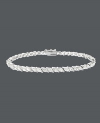 Exemplify elegance. This stunning tennis bracelet by B. Brilliant highlights sparkling, marquise-cut cubic zirconias (7-1/5 ct. t.w.) set in sterling silver. Approximate length: 7-1/4 inches. Exemplify elegance. This stunning tennis bracelet by B. Brilliant highlights sparkling, marquise-cut cubic zirconias (7-1/5 ct. t.w.) set in sterling silver. Approximate length: 7-1/4 inches.