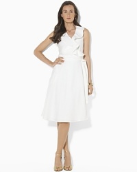 Drawing inspiration from classic menswear style with slim stripes and soft chambray shirting, this flattering wrap design is decidedly feminine with a ruffled V-neckline and full, flowing skirt. Drawing inspiration from classic menswear style with slim stripes and soft chambray shirting, this flattering wrap design is decidedly feminine with a ruffled V-neckline and full, flowing skirt.