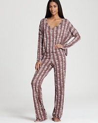 A floral-stripe print and trendy dolman sleeves give this 40 Winks pajama set seasonal style. A floral-stripe print and trendy dolman sleeves give this 40 Winks pajama set seasonal style.