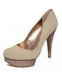 Push the envelope. The Capone pumps by BCBGeneration go sky high on a platform and heel covered in rough, sparkling glitter. Push the envelope. The Capone pumps by BCBGeneration go sky high on a platform and heel covered in rough, sparkling glitter.