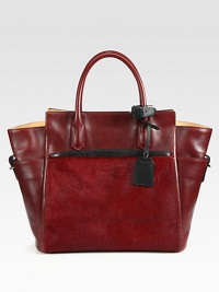 Luxuriously smooth leather with hair calf accents in a modern colorblock design.Double top handles, 5½ dropToggle strap closureFour outside open pocketsOne detachable zip pouchTwo inside zip pocketsCotton lining12¾W X 13¾H X 4½DImported Luxuriously smooth leather with hair calf accents in a modern colorblock design.Double top handles, 5½ dropToggle strap closureFour outside open pocketsOne detachable zip pouchTwo inside zip pocketsCotton lining12¾W X 13¾H X 4½DImported