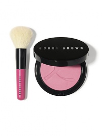 Exclusive set in honor of Breast Cancer Awareness Month. Bobbi will be donating $10 of every sale of this set during the month of October to The Breast Cancer Research Foundation®. Featuring our Illuminating Bronzing Powder in Pink Peony, an innovative blend of sheer powder and micro pearls to give skin a natural-looking glow. We paired its mirrored compact with a Mini Face Blender Brush topped off with a bright pink handle. It's a fun way to put on your makeup and show your support.