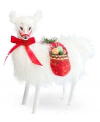 Sweet on Christmas, this snow-white llama has saddlebags stuffed with sugary treats. With the soft, flexible features and distinct charm of Annalee figurines. Sweet on Christmas, this snow-white llama has saddlebags stuffed with sugary treats. With the soft, flexible features and distinct charm of Annalee figurines.