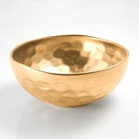 Michael Wainwright has created elegant porcelain since 1991. Each piece is made of porcelain and fired in a kiln at least three times. First, the rims are cut by hand, so that no two pieces are exactly alike. Second, the wares are glazed by hand and fired to nearly 2200 degrees F., 22-karat gold or platinum is hand painted on each piece and fired in a kiln one more time, resulting in a finish that is dishwasher-safe. Michael Wainwright has created elegant porcelain since 1991. Each piece is made of porcelain and fired in a kiln at least three times. First, the rims are cut by hand, so that no two pieces are exactly alike. Second, the wares are glazed by hand and fired to nearly 2200 degrees F., 22-karat gold or platinum is hand painted on each piece and fired in a kiln one more time, resulting in a finish that is dishwasher-safe.