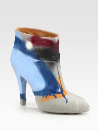 Fine craftsmanship defines this modern ankle boot of cement-covered leather, topped with graffiti in vivid hues. Self-covered heel, 4½ (115mm)Cement-dipped leather upperPull-on styleLeather lining and solePadded insoleMade in Italy Fine craftsmanship defines this modern ankle boot of cement-covered leather, topped with graffiti in vivid hues. Self-covered heel, 4½ (115mm)Cement-dipped leather upperPull-on styleLeather lining and solePadded insoleMade in Italy