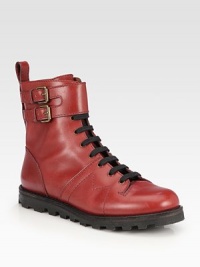 Edgy leather kicks with signature letter stitching and adjustable buckle straps for a casual-cool look. Stacked platform, 1 (25mm)Leather upperAdjustable ankle strapsLeather liningRubber trek solePadded insoleImported Edgy leather kicks with signature letter stitching and adjustable buckle straps for a casual-cool look. Stacked platform, 1 (25mm)Leather upperAdjustable ankle strapsLeather liningRubber trek solePadded insoleImported