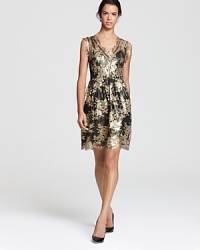 Gilded lace on this Madison Marcus dress is one glamorous way to achieve elegant, on-trend shine for all of this season's soirées. Gilded lace on this Madison Marcus dress is one glamorous way to achieve elegant, on-trend shine for all of this season's soirées.