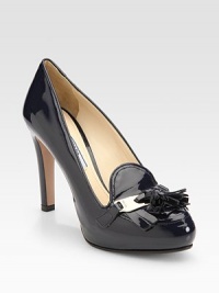 A fringe tassel and kiltie complete this patent leather silhouette. Self-covered heel, 4 (100mm)Hidden platform, ¾ (80mm)Compares to a 3¼ heel (50mm)Patent leather upperLeather lining and solePadded insoleMade in Italy A fringe tassel and kiltie complete this patent leather silhouette. Self-covered heel, 4 (100mm)Hidden platform, ¾ (80mm)Compares to a 3¼ heel (50mm)Patent leather upperLeather lining and solePadded insoleMade in Italy