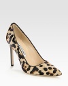 An animalistic point toe silhouette with leopard-printed pony hair and smooth leather trim. Stacked heel, 4 (100mm)Leopard-print pony hair upperPoint toeLeather lining and solePadded insoleMade in Italy